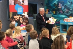 Sen. Moulton reads aloud to a group of preschool children at the Marshfield Center Chippewa Falls Pediatric clinic